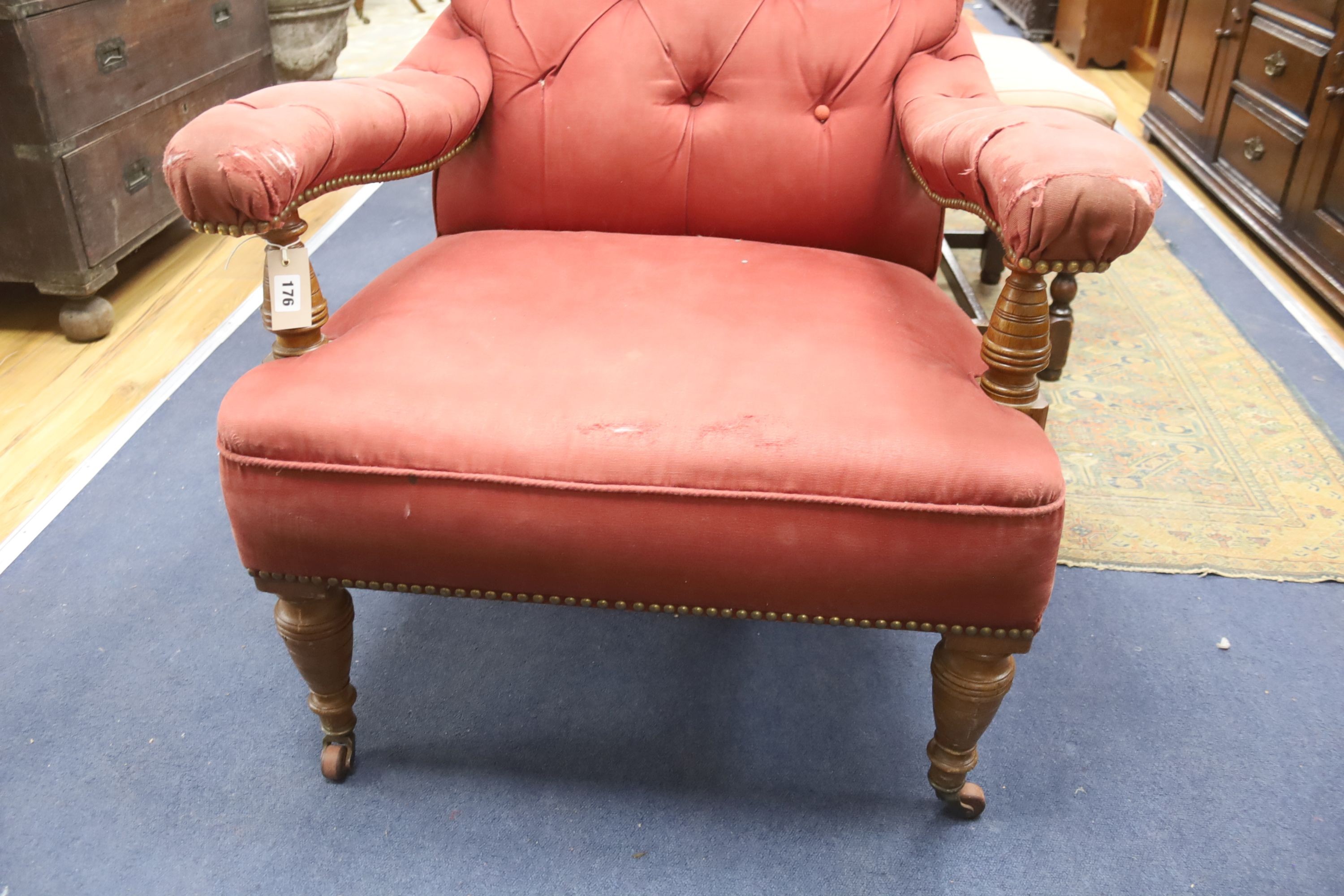 A Victorian oak upholstered open armchair, width 74cm, depth 84cm, height 98cm